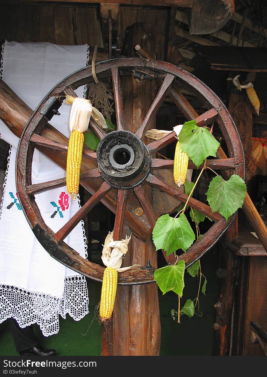 Antique Cart Wheel made of wood and iron-lined, decorated. Antique Cart Wheel made of wood and iron-lined, decorated