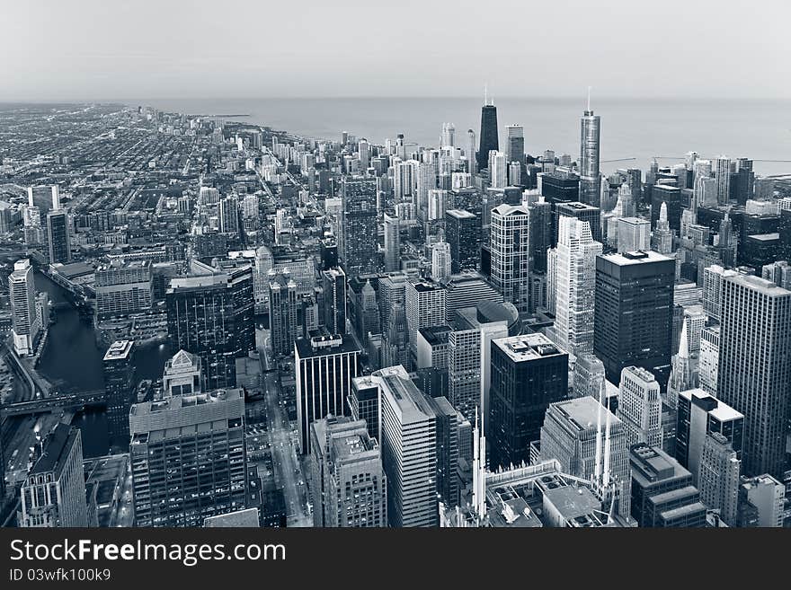 Aerial view of Chicago downtown at twilight from high above. Aerial view of Chicago downtown at twilight from high above.