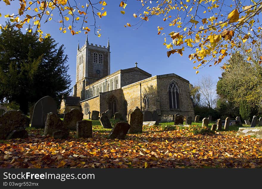 Autumn Leaves in The Old Church and Graveyard at Badby, Northamptonshire, England. Autumn Leaves in The Old Church and Graveyard at Badby, Northamptonshire, England