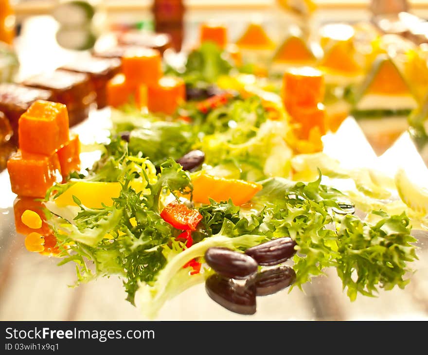 Fresh green salad and beans in mirror. Fresh green salad and beans in mirror.