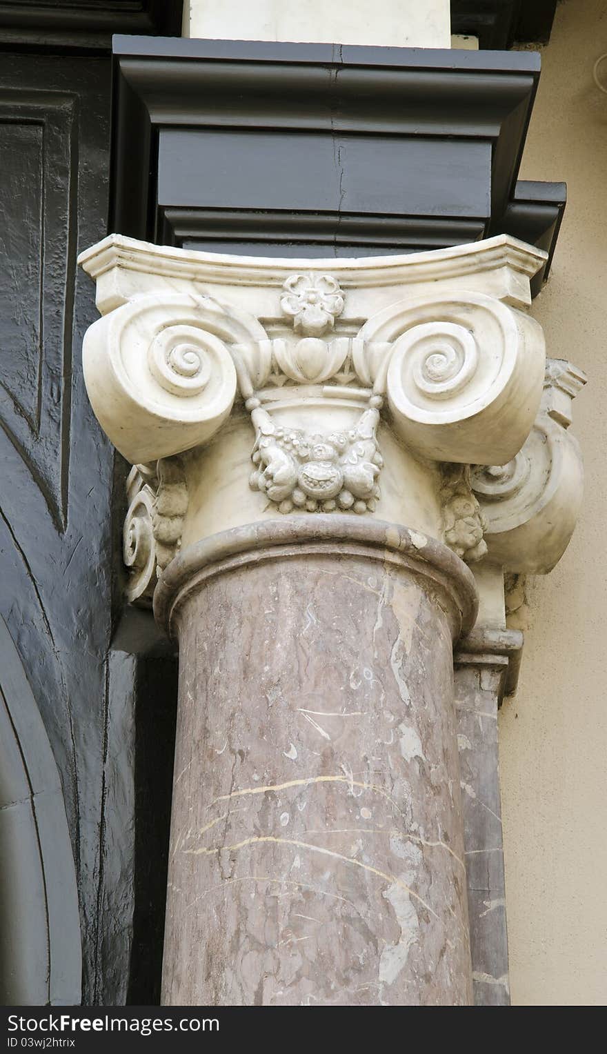 Interesting ancient building column fragment. Old construction industry detail.