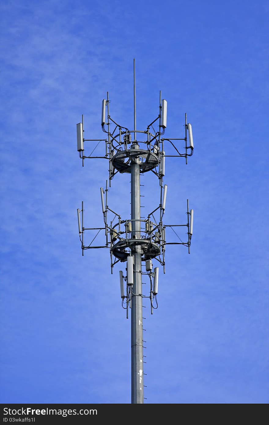 Mobile phone signal tower on blue sky. Mobile phone signal tower on blue sky