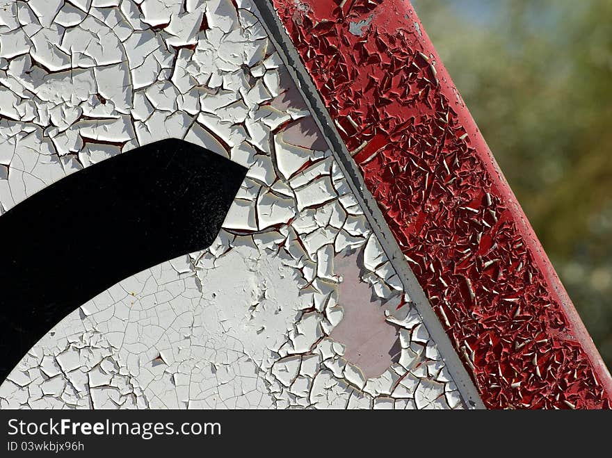 Detail of a decrepit traffic sign. Detail of a decrepit traffic sign