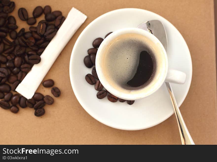 Cup of coffee on a beige background