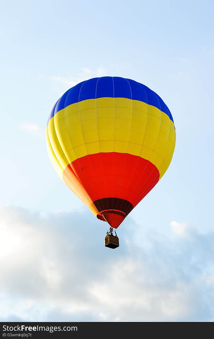 Colorful hot air balloon against a white background