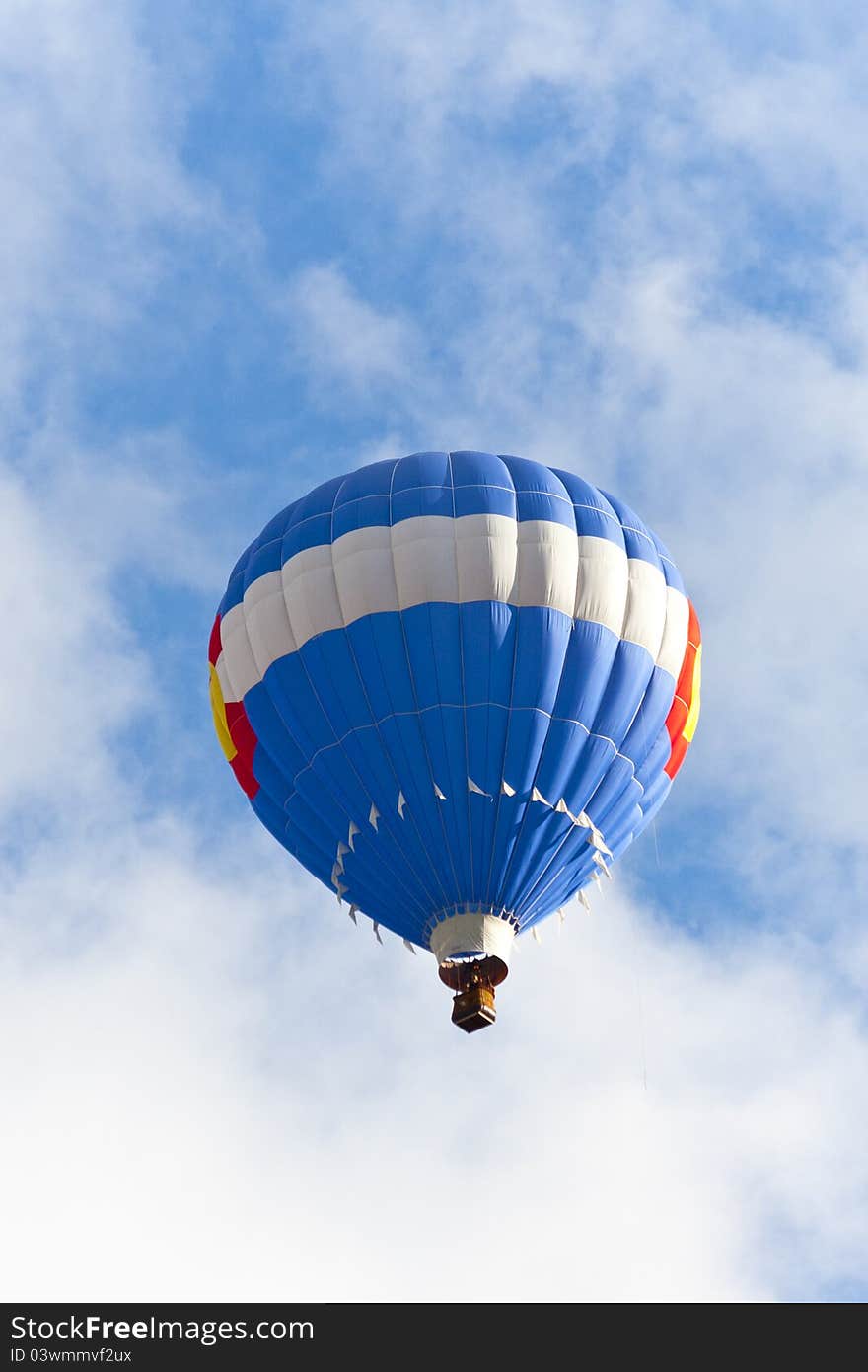 Blue hot balloon up in the blue sky. Balloon Festival, Colorado, USA