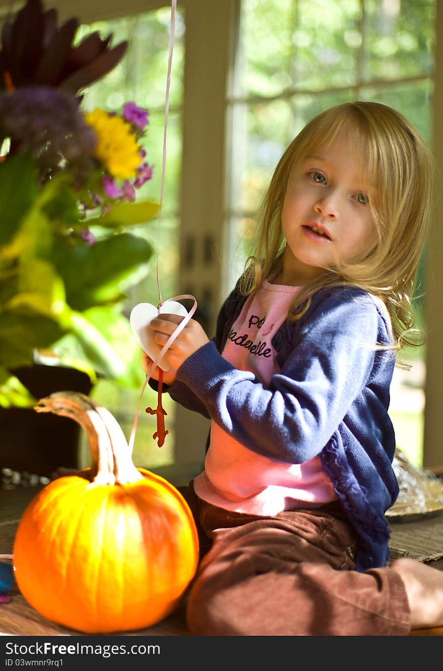 Young Girl Preparing for Halloween