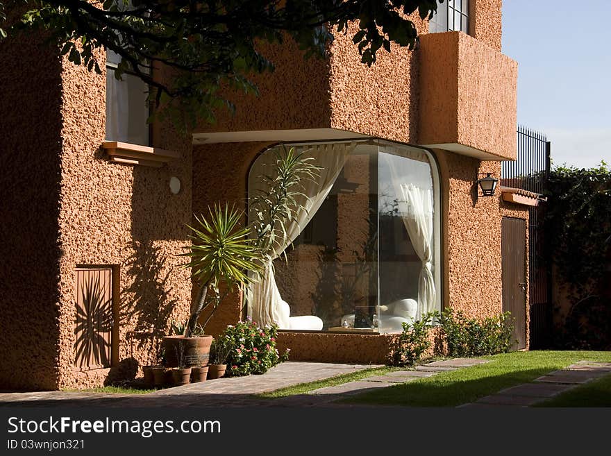 Outdoor view of a house with plants. Outdoor view of a house with plants