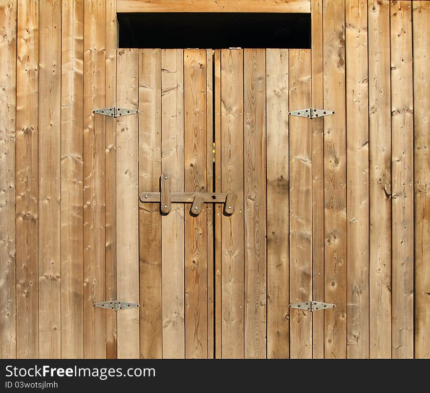 Closeup of an exterior wood door. Closeup of an exterior wood door