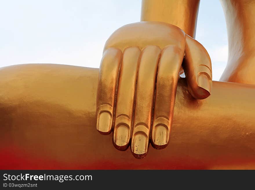 Hand of the Big Golden Buddha with gold flake in Pattaya, Thailand