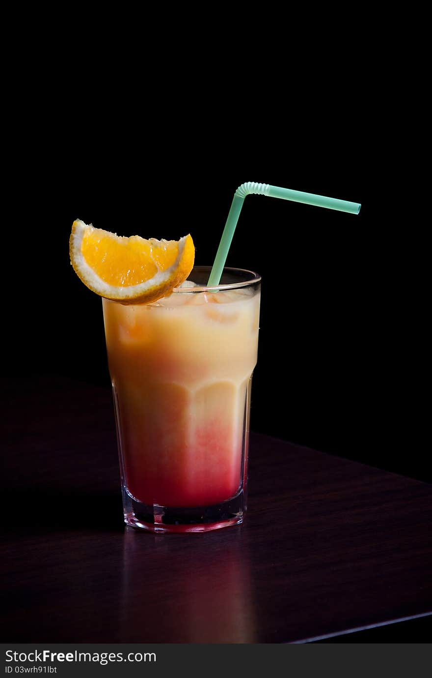 Alcohol drink with fruit and straw. Alcohol drink with fruit and straw