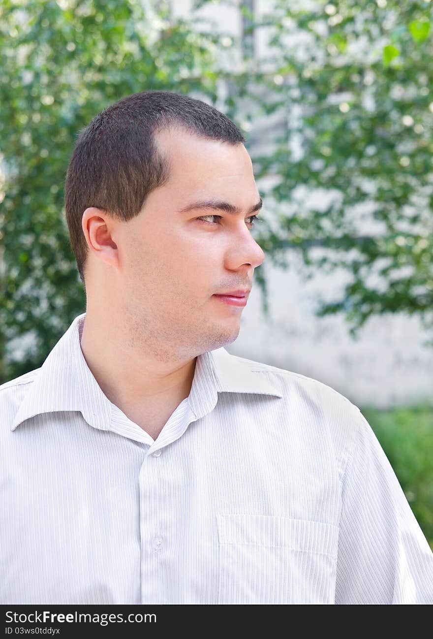 Outdoors portrait of young man in the park. Outdoors portrait of young man in the park