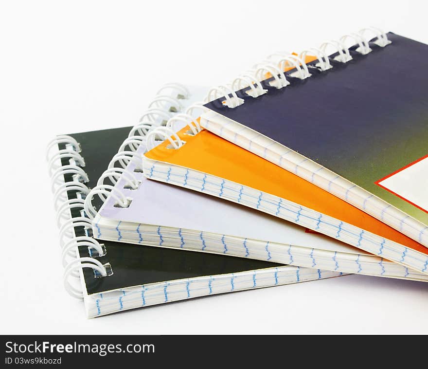 Stack of ring binder book or notebook on white background