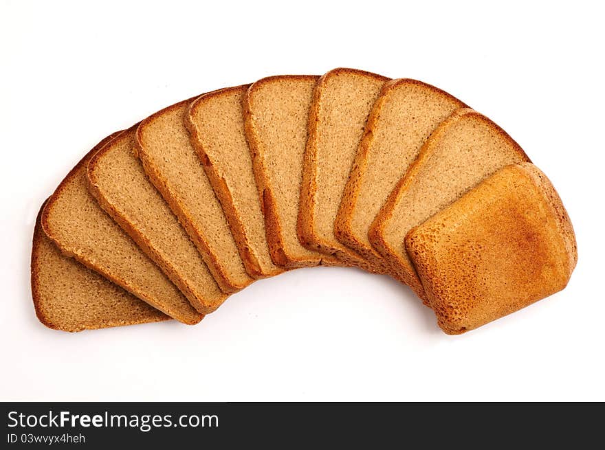 Cut bread on a white background