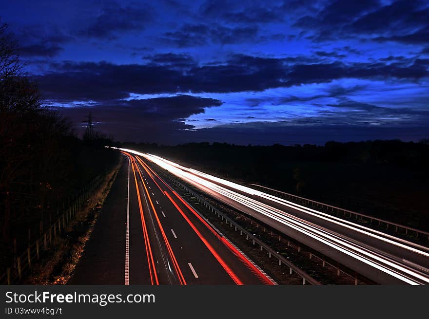 Cars on road at sunset. Cars on road at sunset.