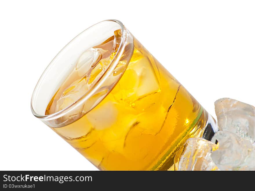 Whiskey with ice cubes. Isolated on white background