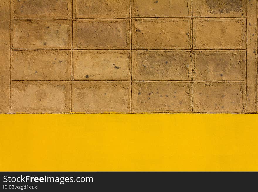 Walls of brown clay. Located on the cement walls are yellow.