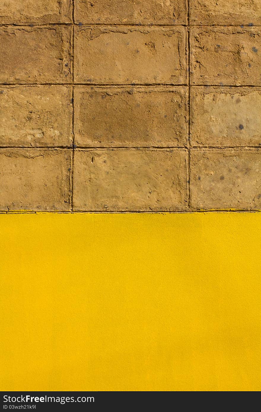 Walls of brown clay. Located on the cement walls are yellow.