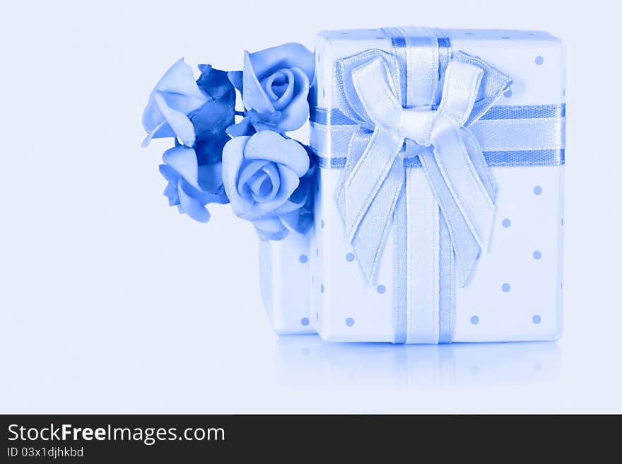 Present box and flower boutonniere