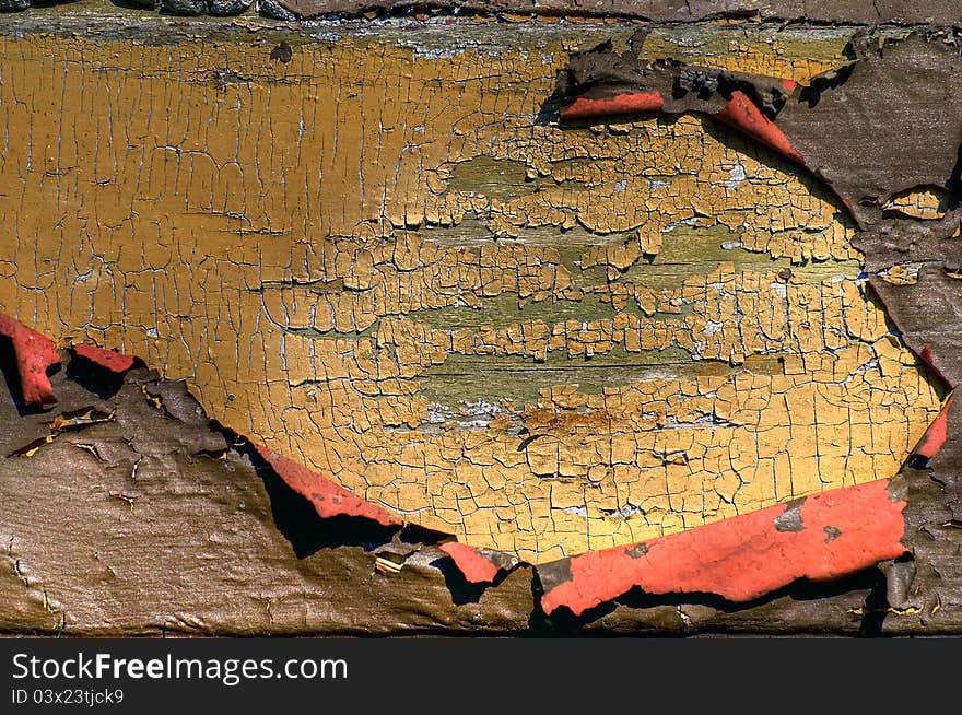 Outer wall of old cottage, several layers of paint exposed. Outer wall of old cottage, several layers of paint exposed