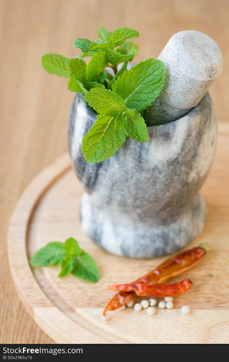 Fragrant Mint In A Ceramic Mortar And Spices