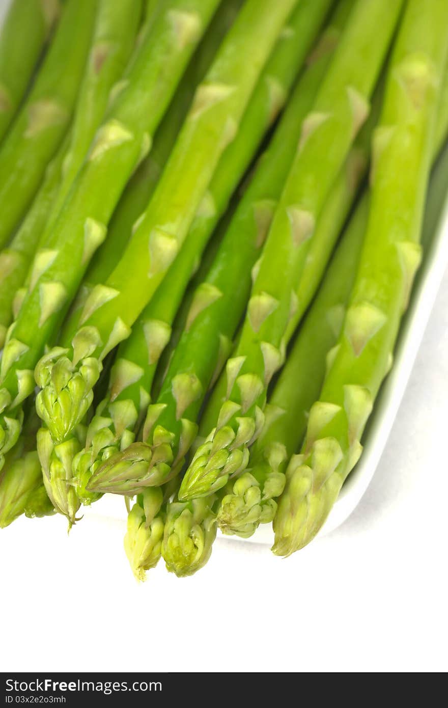 Green Asparagus On A White Background.