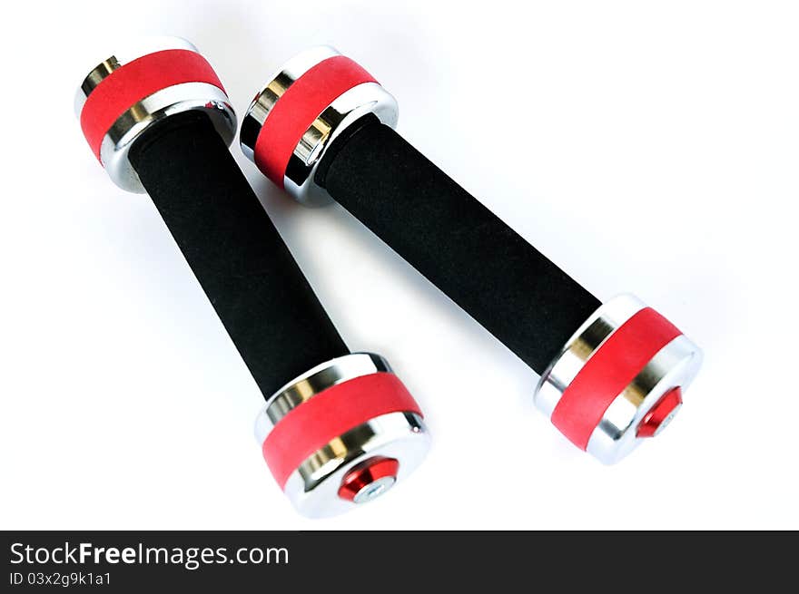 Healthy life concept red dumbbells on white background