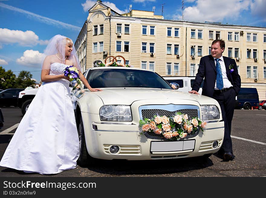 Bride And Groom About Wedding Limousine