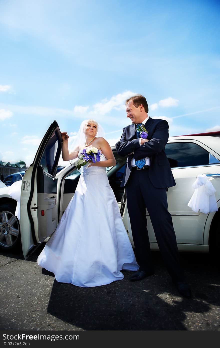 Bride And Groom About Wedding Limousine