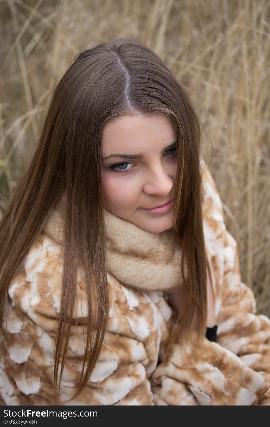 Portrait of young beautiful girl who smiles