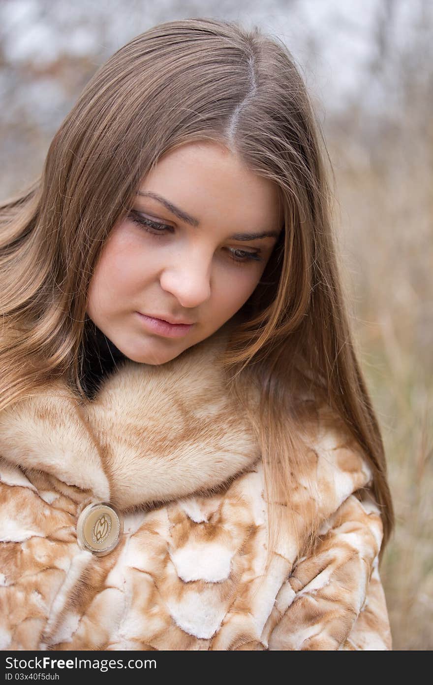 Young Woman In A Fur Coat