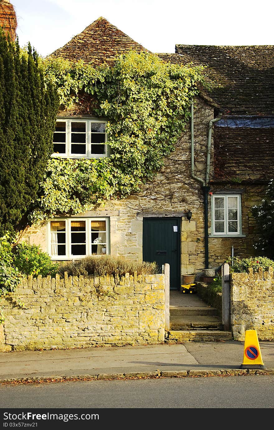 English cottage in a autumn day