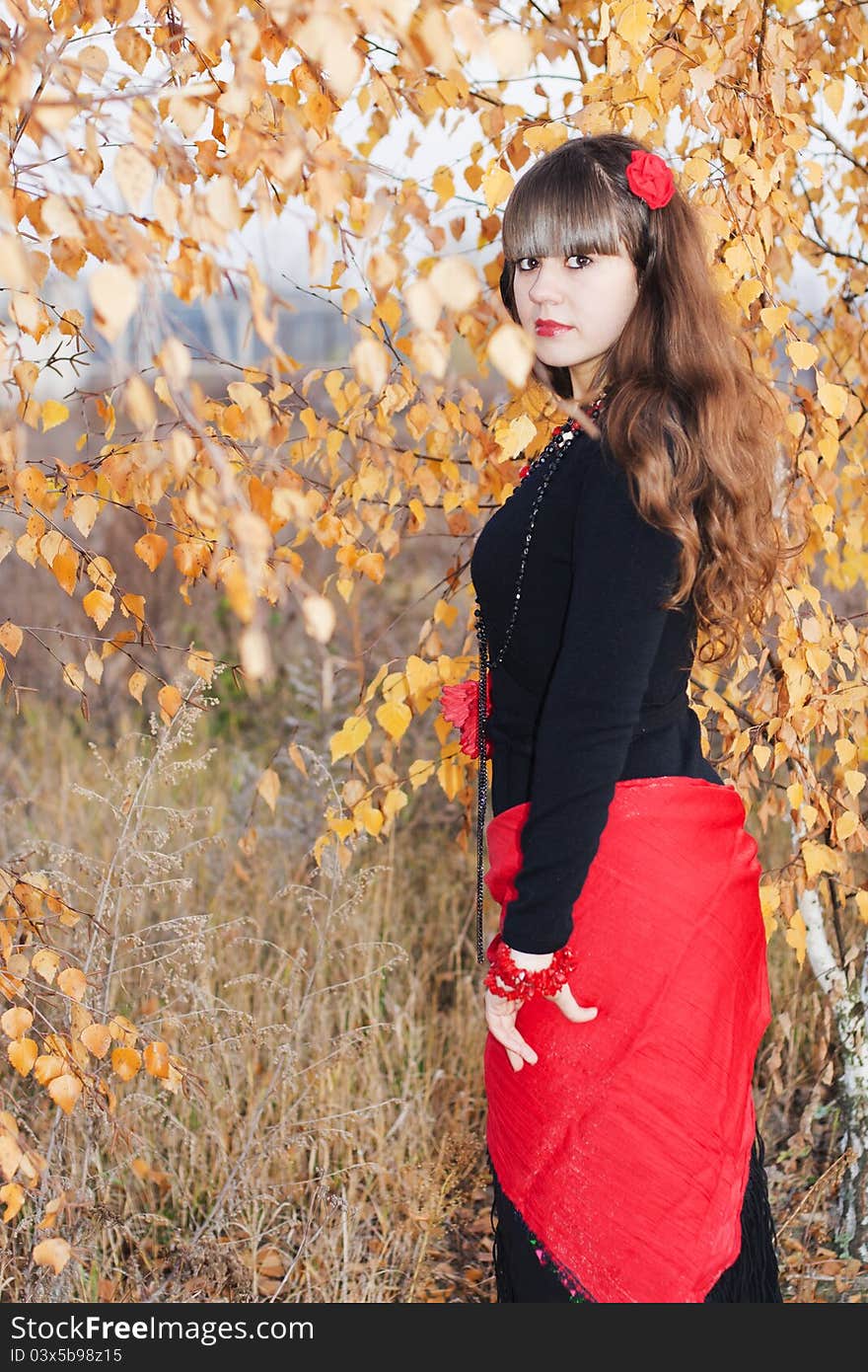 Young Girl Over Autumnal Background