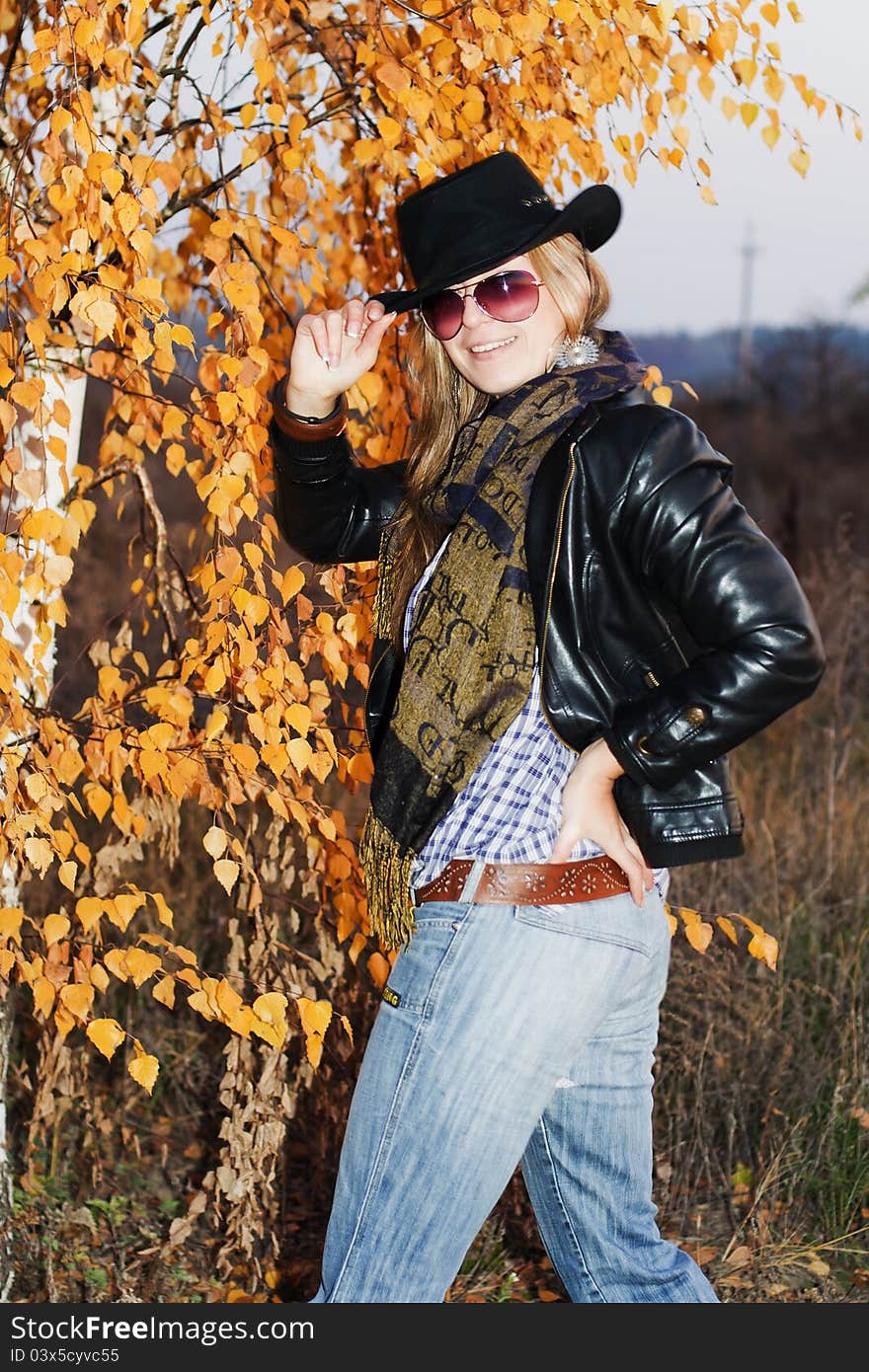 Young Girl Over Autumnal Background