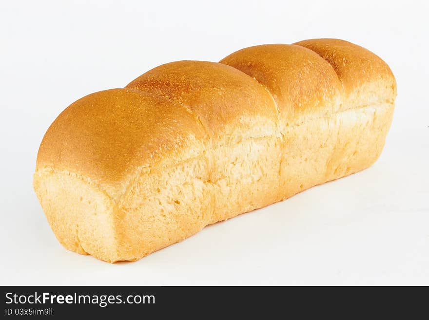 Loaf of bread on white background