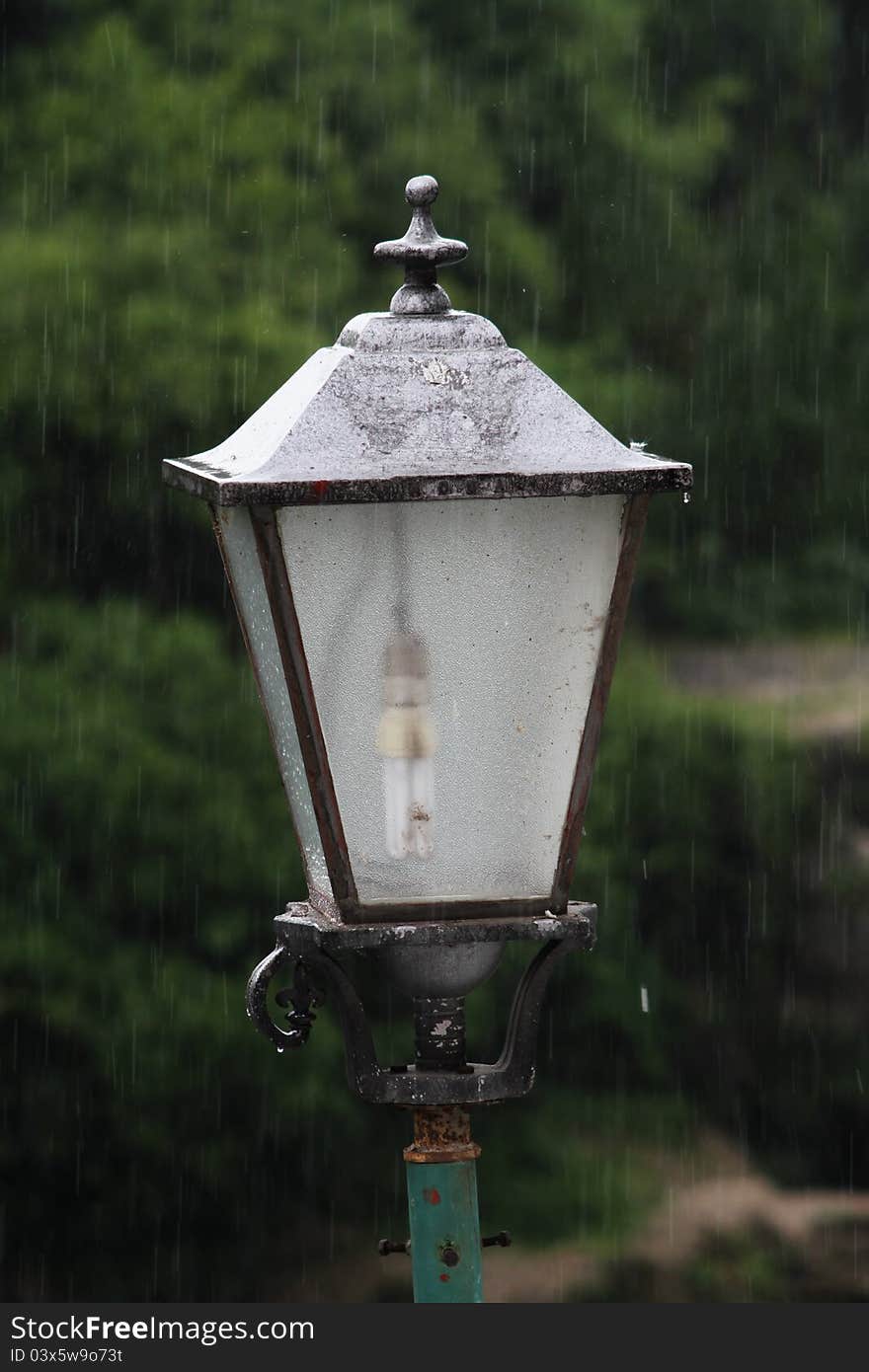 Old city lamp on rain