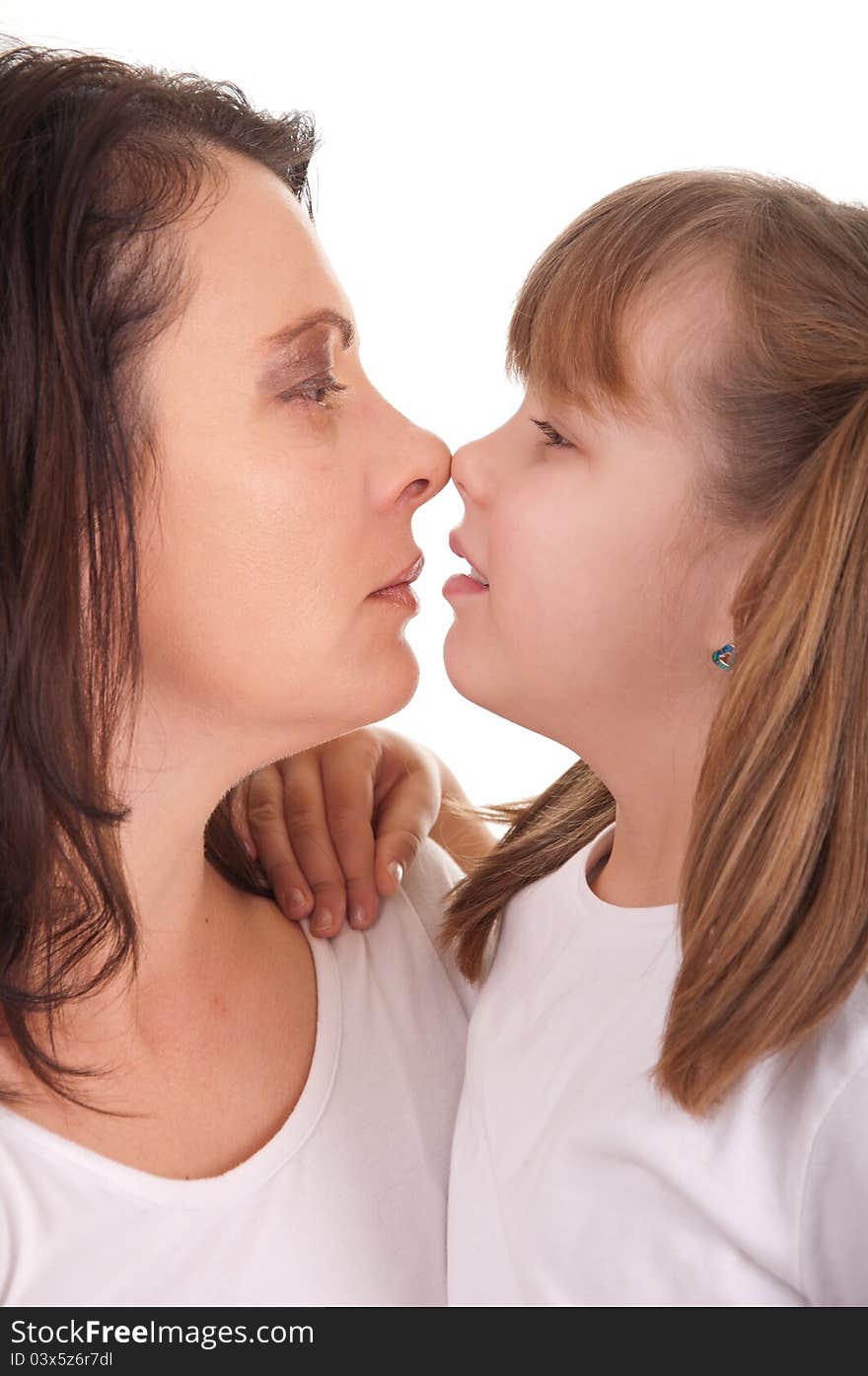 Girl and  mother isolated on white