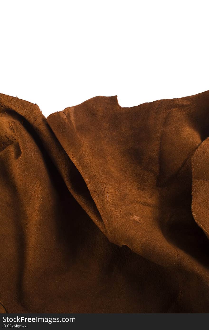 Brown cow leather texture close up on white background. Included clipping path, so you can easily cut it out and place over the top of a design. Brown cow leather texture close up on white background. Included clipping path, so you can easily cut it out and place over the top of a design.