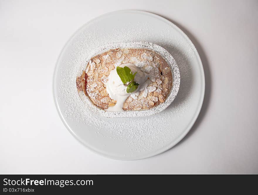 Apple pie with ice cream and mint