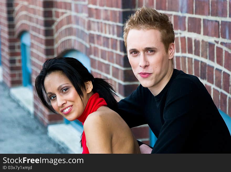 Smiling East Indian woman and caucasian man