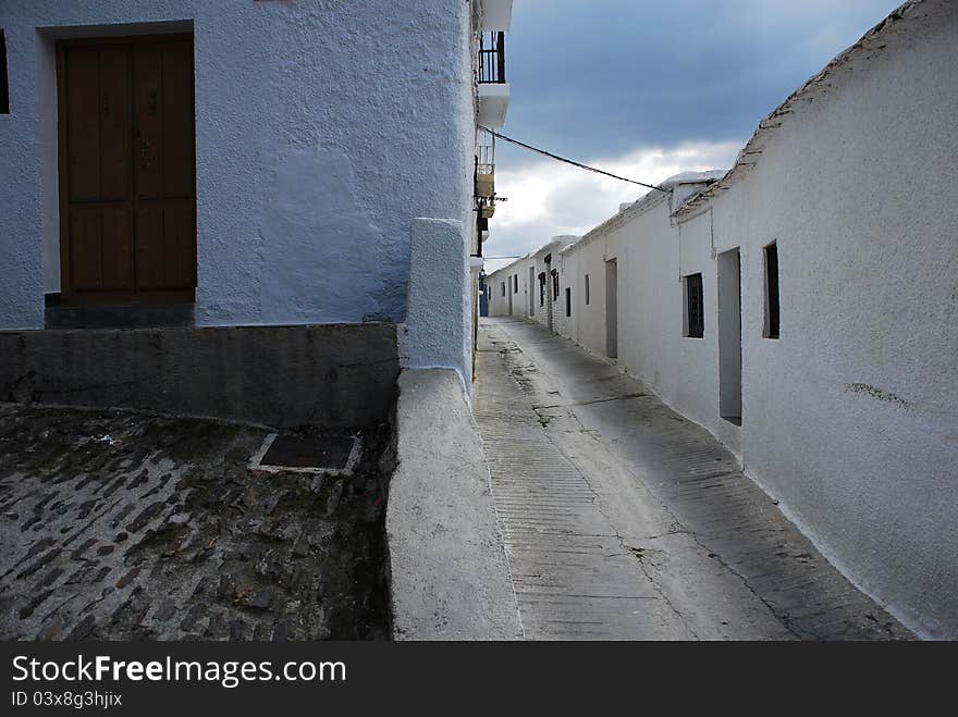 Alpujarras street in Capileira, Granada, Andalusia, Spain. Alpujarras street in Capileira, Granada, Andalusia, Spain