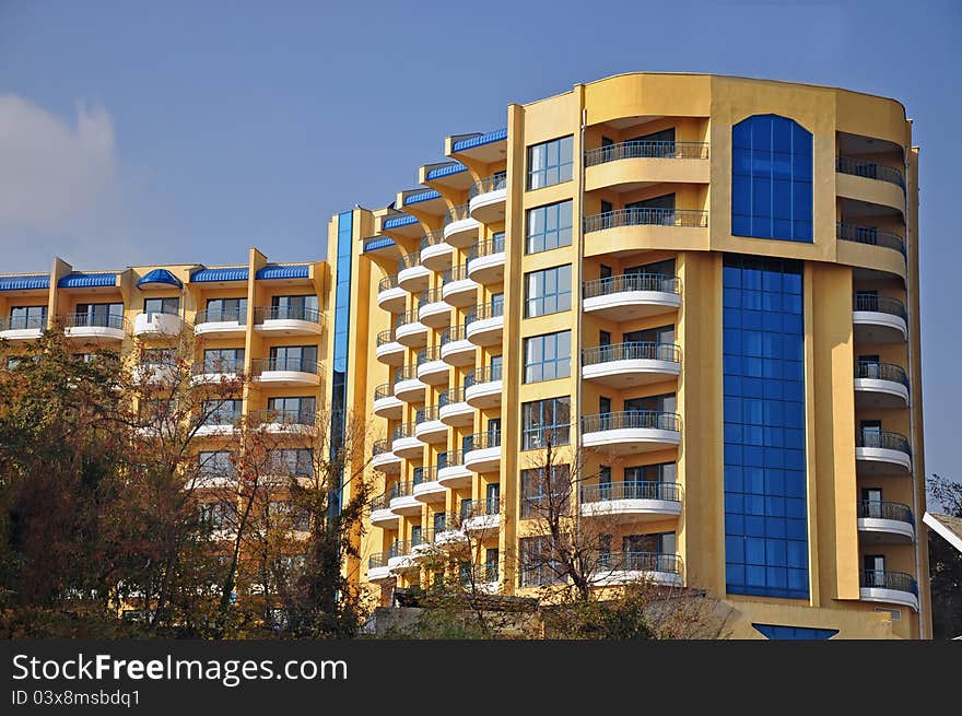 Blue windows and white balconies