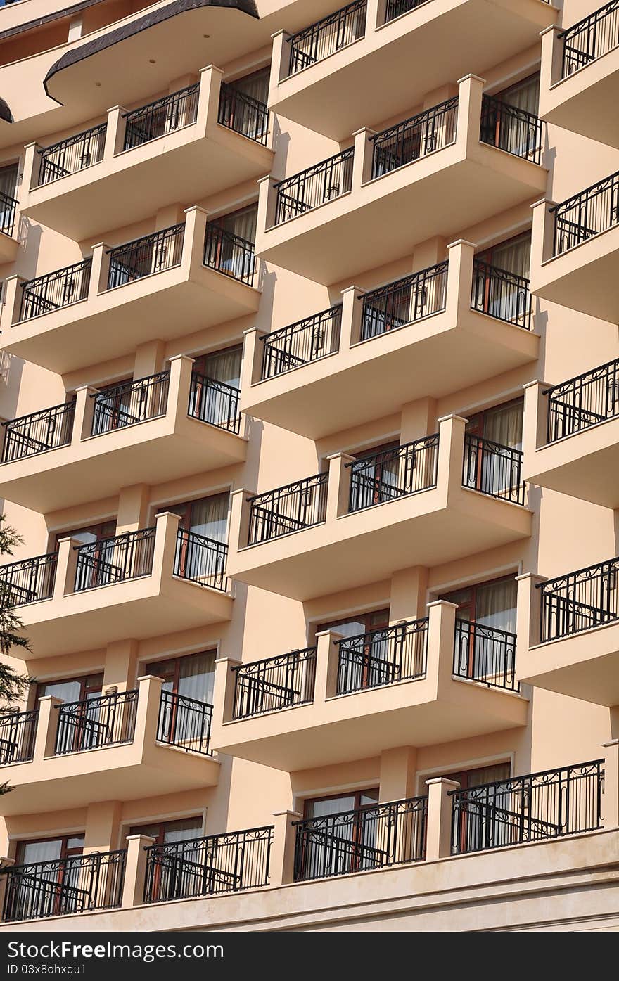 Windows and yellow balconies