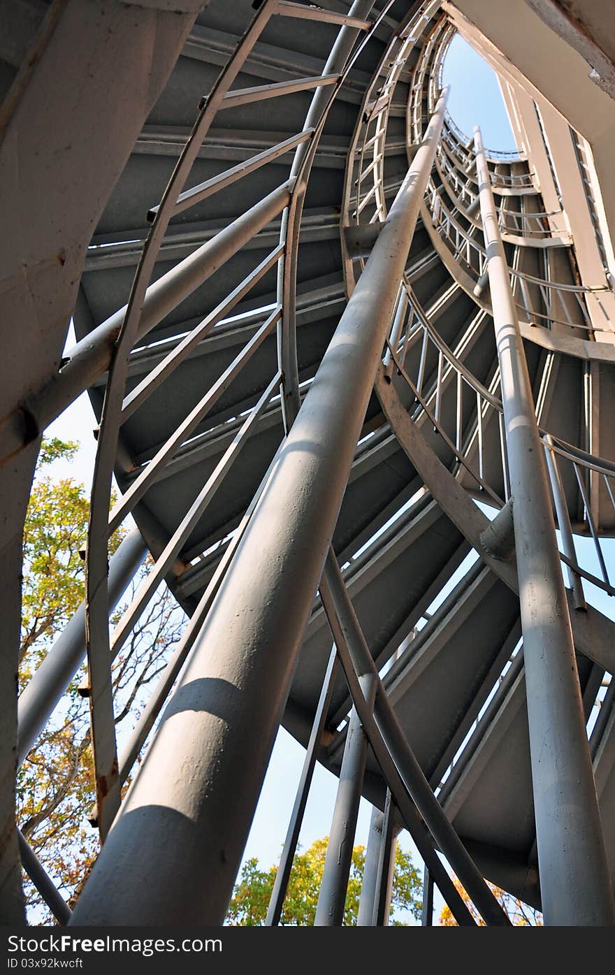 Spiral stairs with metallic railing