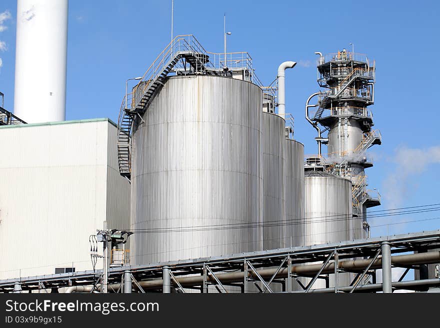 Refinery plant with tanks and cooling towers