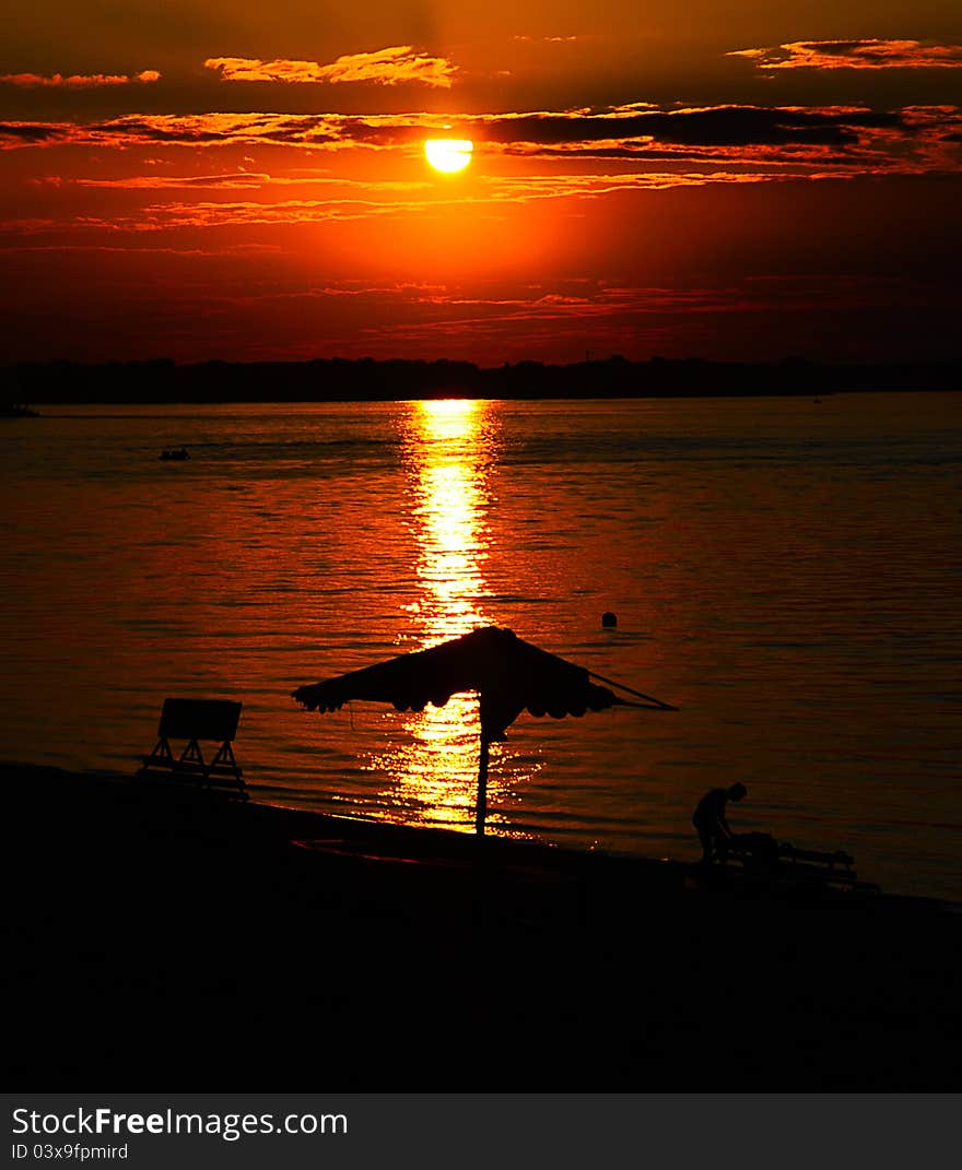 View of the sunset and the beach promenade in the city