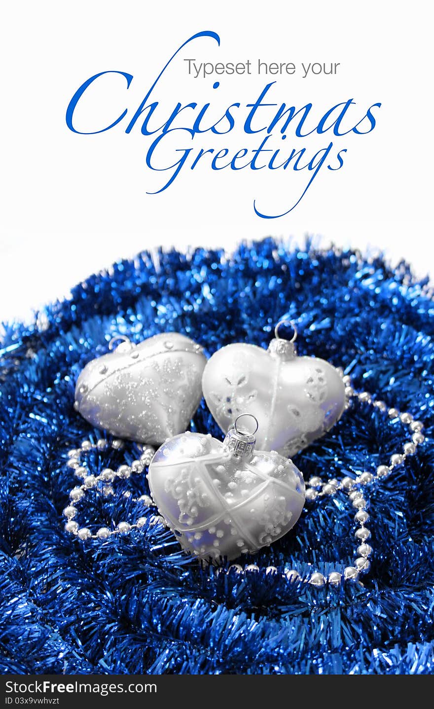 Silver Christmas hearts on blue decoration garland background