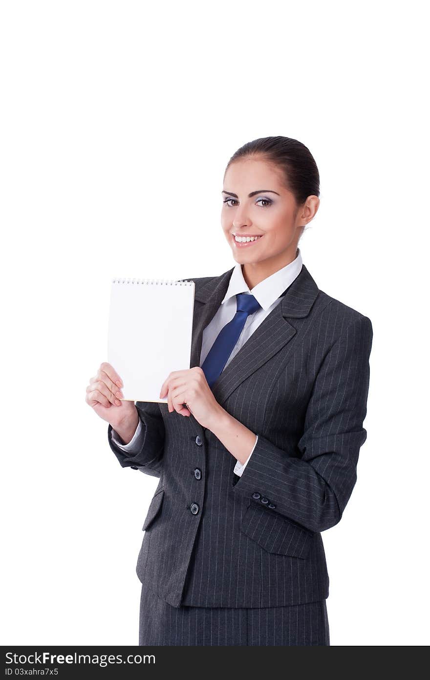 Young businesswoman pointing into empty blank and smiling