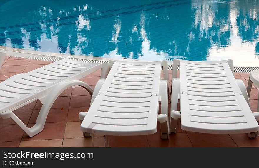 Sunbeds near the Swimming pool