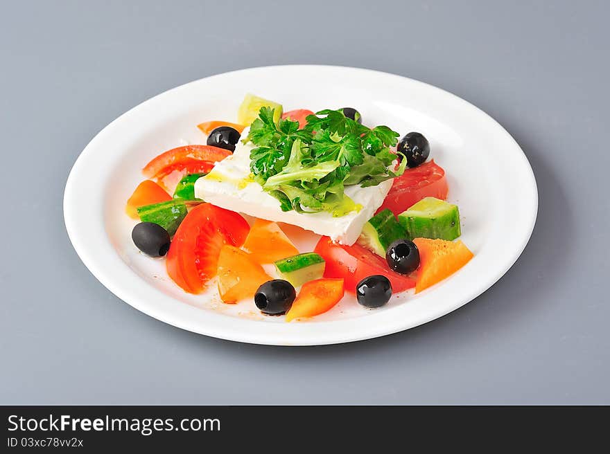 Vegetables salad with feta cheese. Vegetables salad with feta cheese